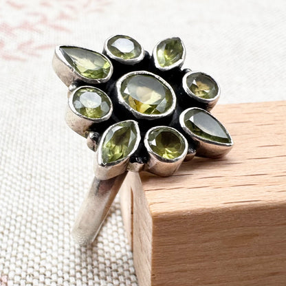 Silver peridot cluster ring, size R.5 (US 9)