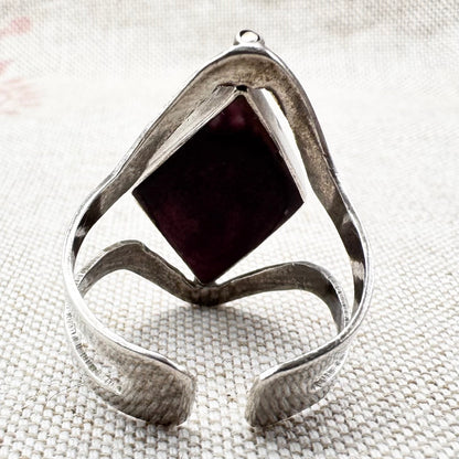 Silver spinner ring with coloured stone panels, adjustable size