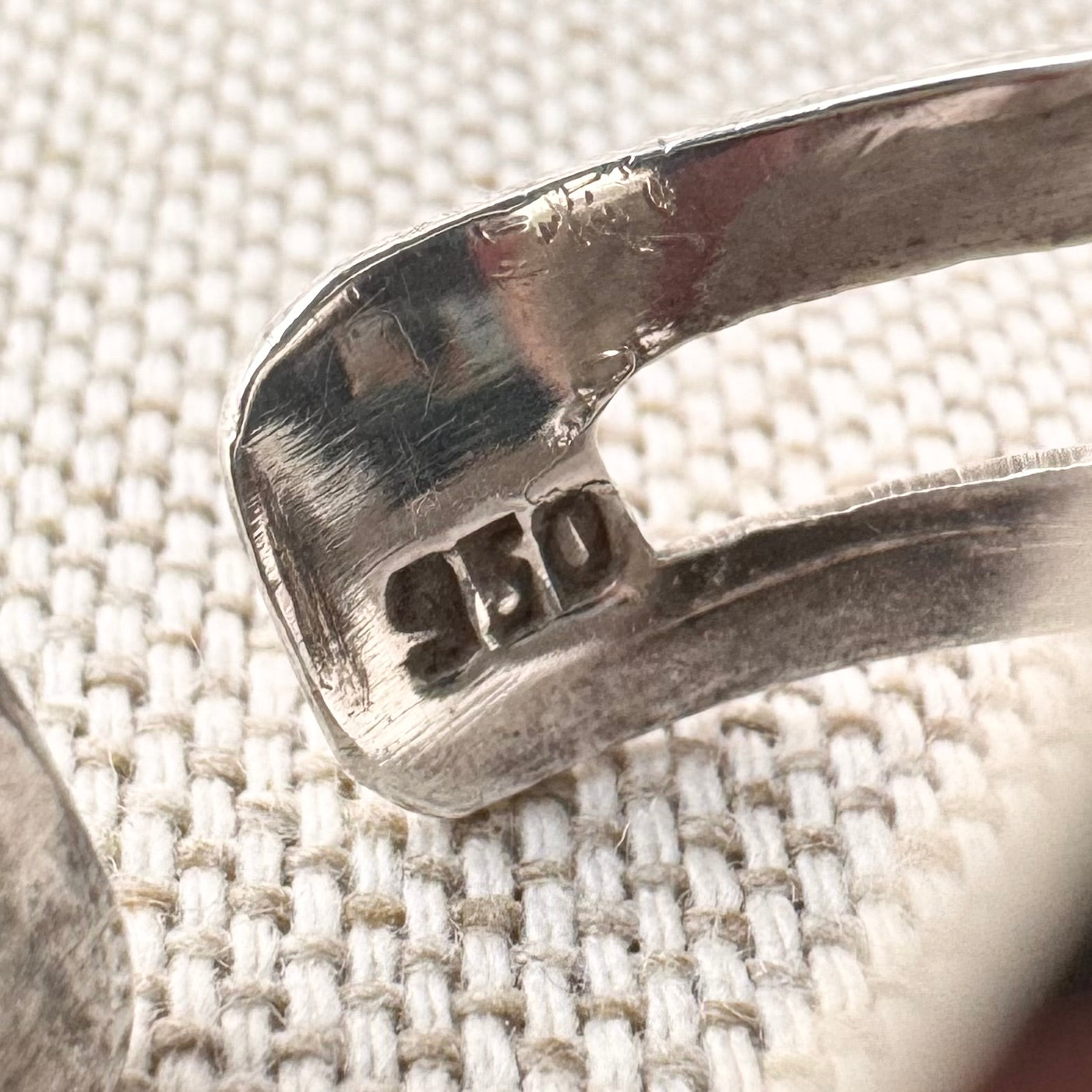 Silver spinner ring with coloured stone panels, adjustable size