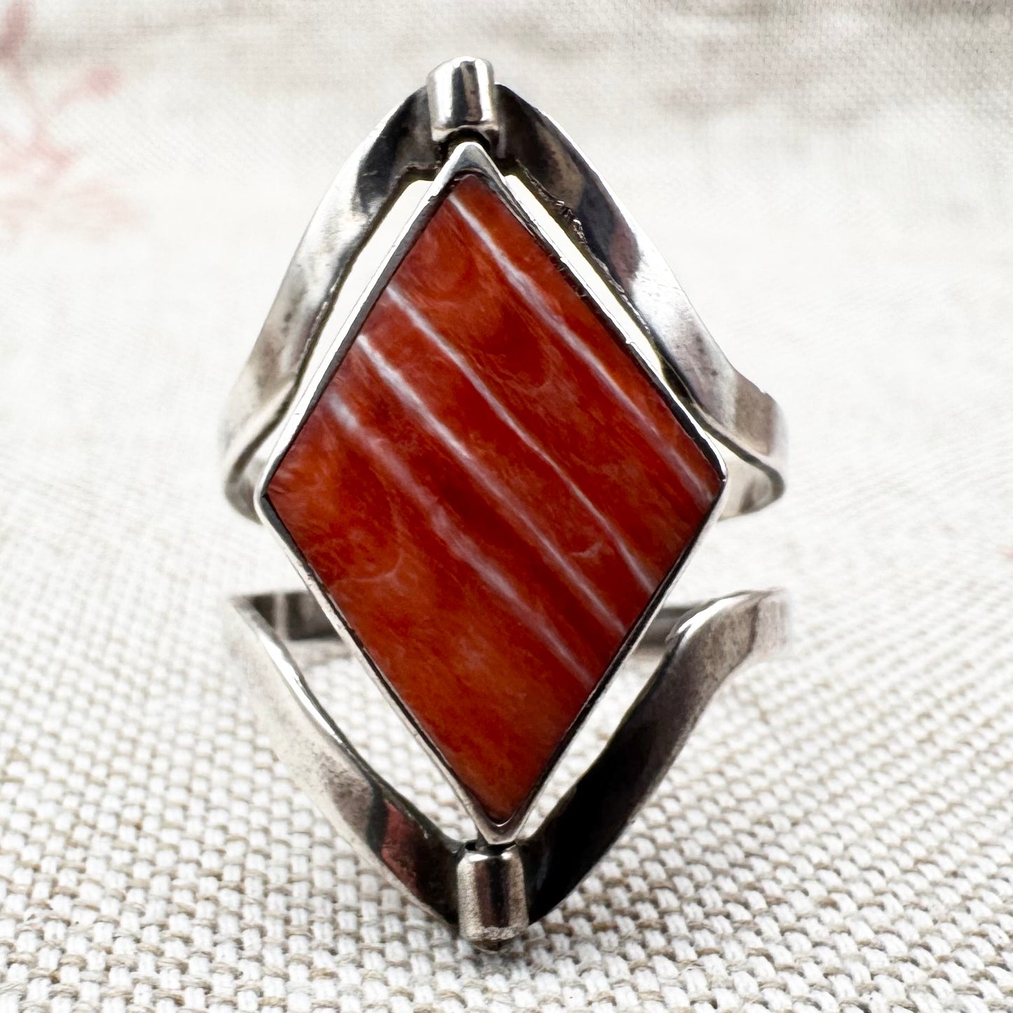 Silver spinner ring with coloured stone panels, adjustable size