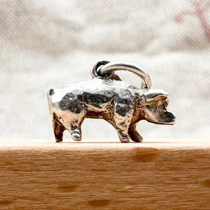 Small silver pig charm pendant