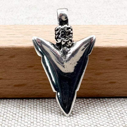 Silver arrowhead pendant