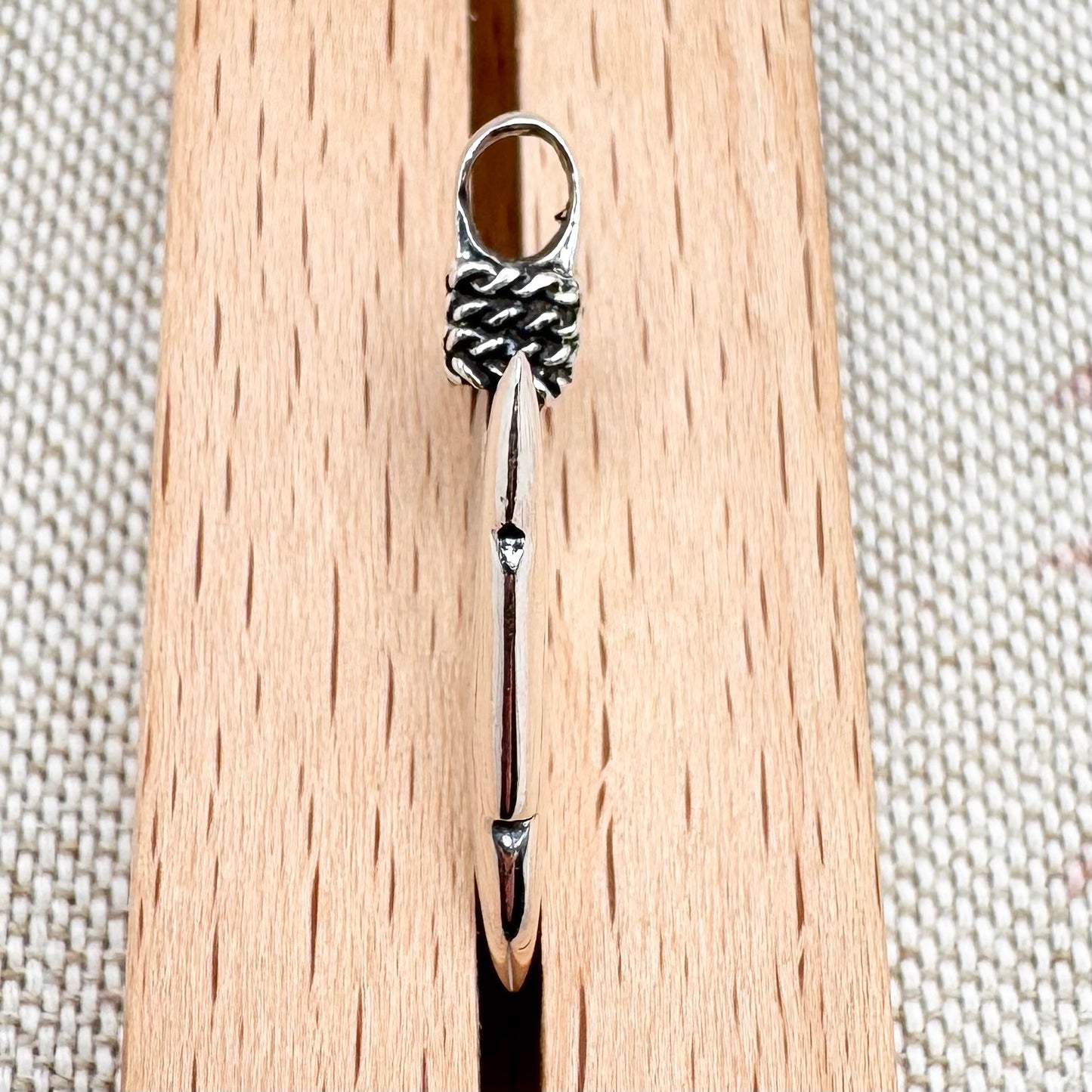 Silver arrowhead pendant
