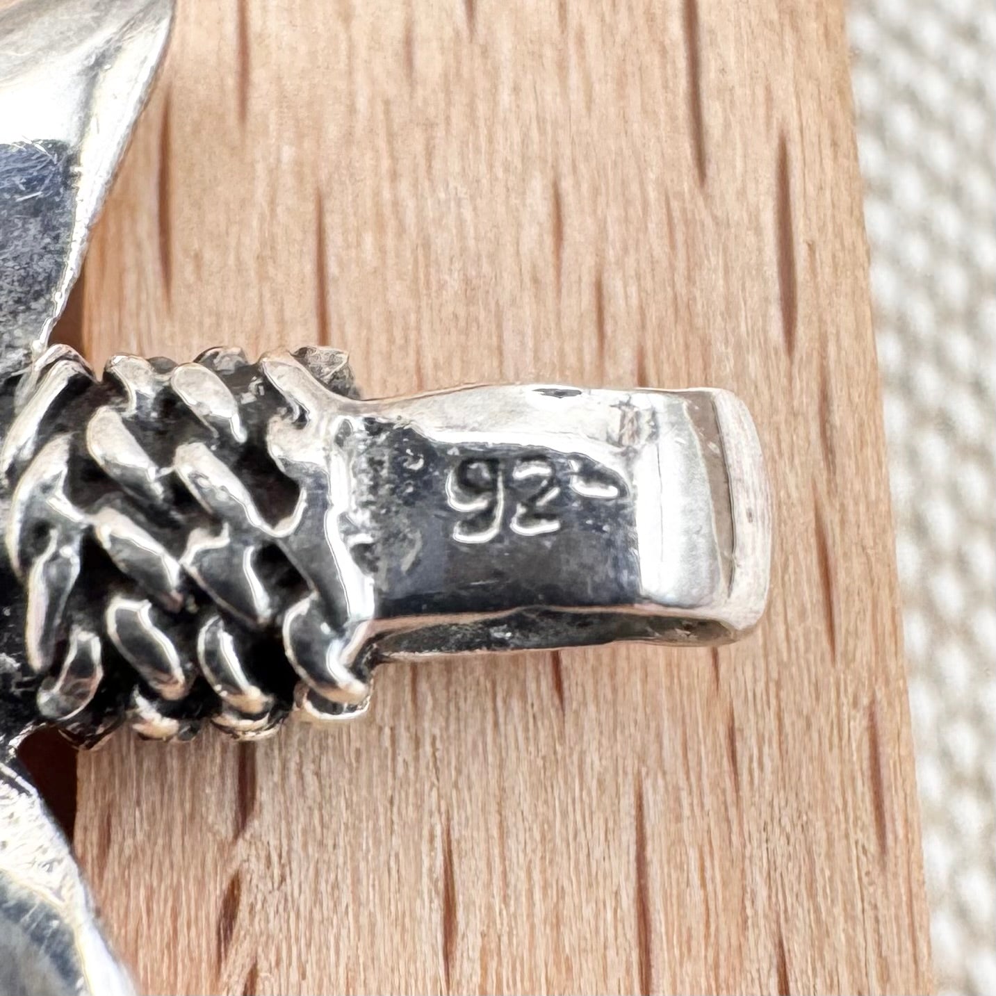 Silver arrowhead pendant