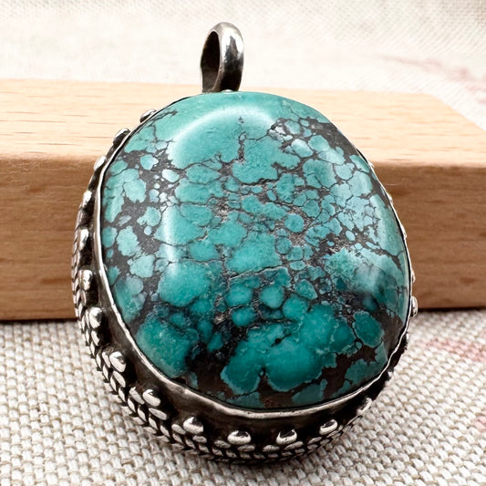 Silver and turquoise pendant
