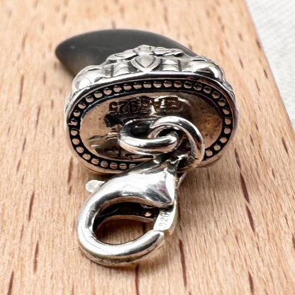 Thomas Sabo sterling silver tooth charm with skull detail