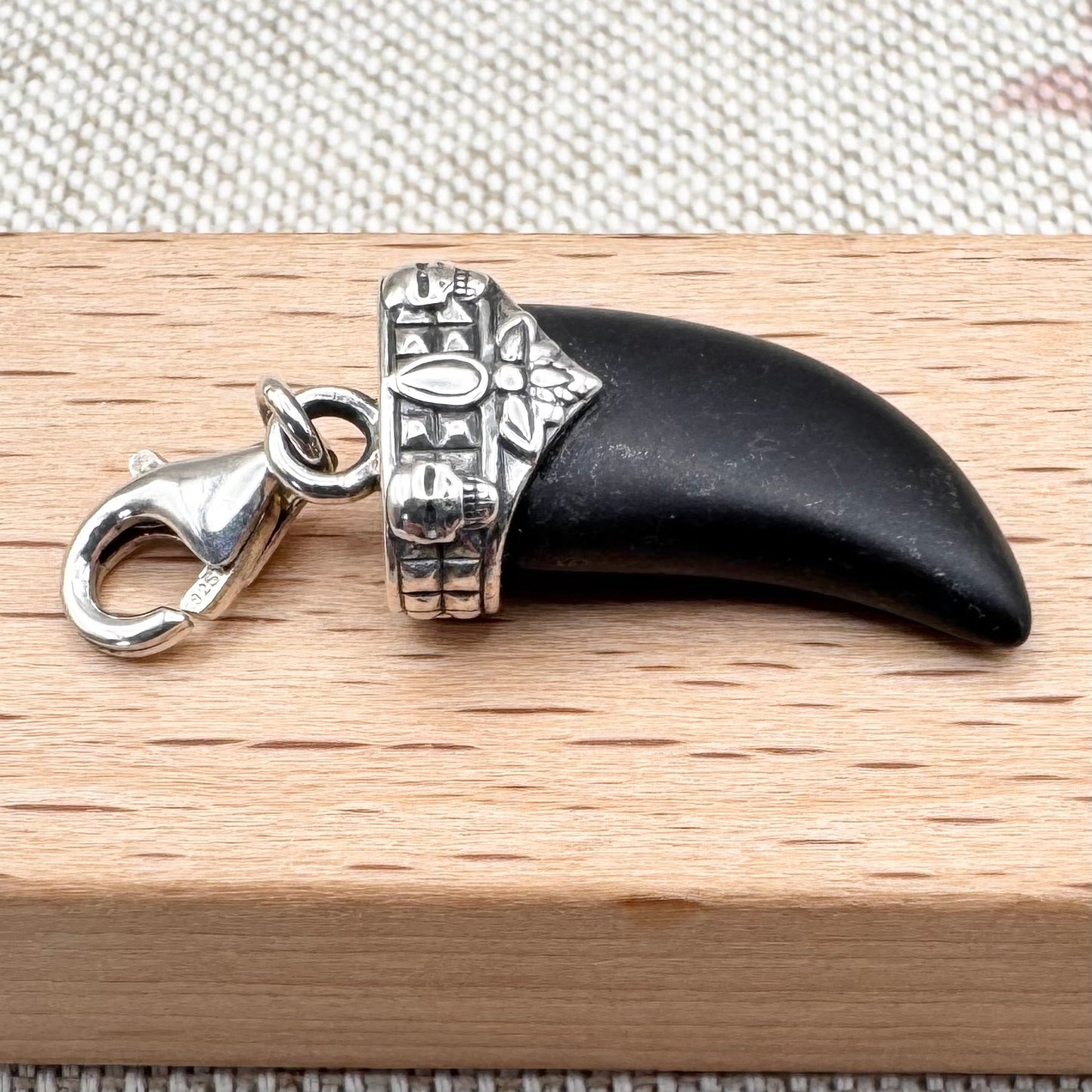Thomas Sabo sterling silver tooth charm with skull detail