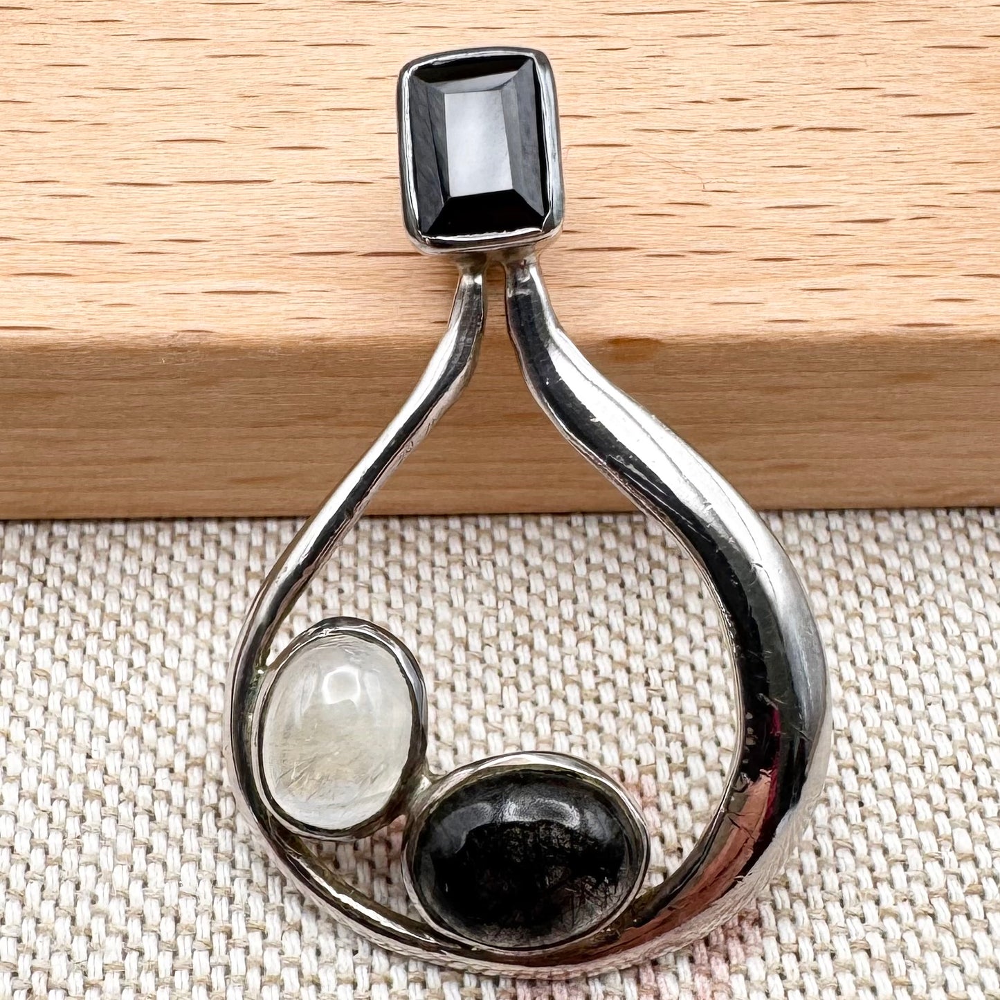Silver pendant with onyx, moonstone & tourmalinated quartz
