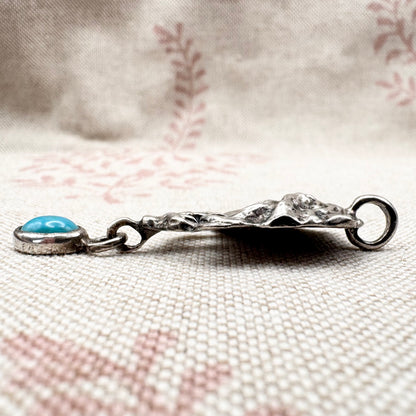 Art Nouveau style silver lady pendant with turquoise drop, hallmarked London 1973