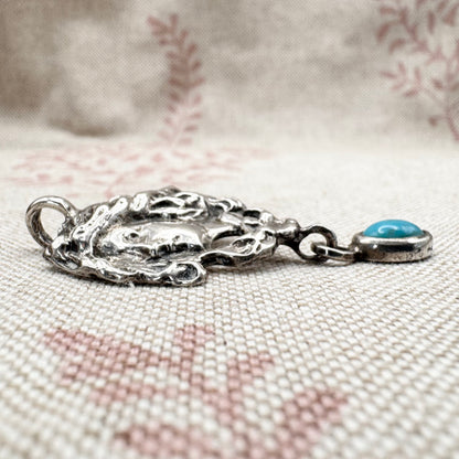 Art Nouveau style silver lady pendant with turquoise drop, hallmarked London 1973