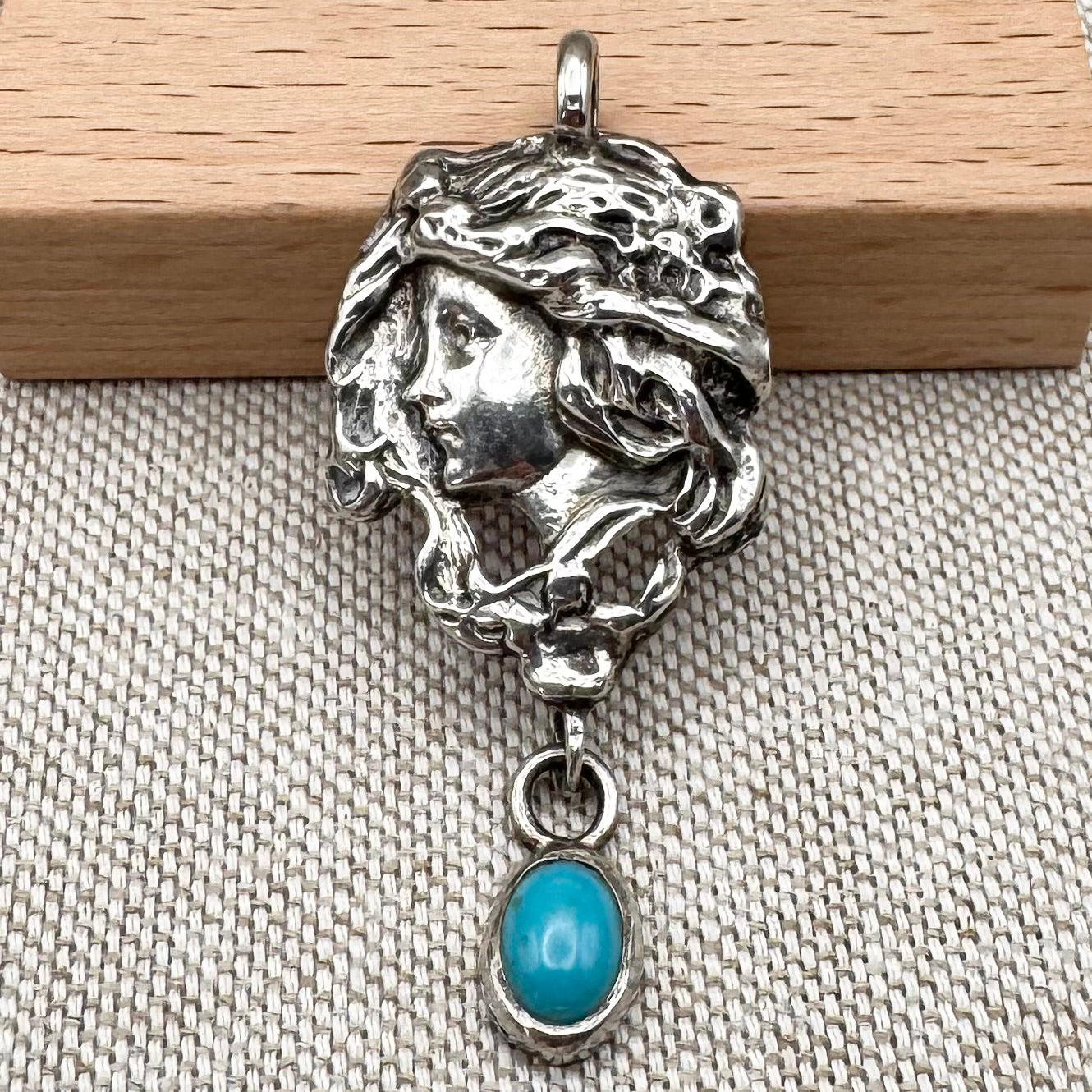 Art Nouveau style silver lady pendant with turquoise drop, hallmarked London 1973