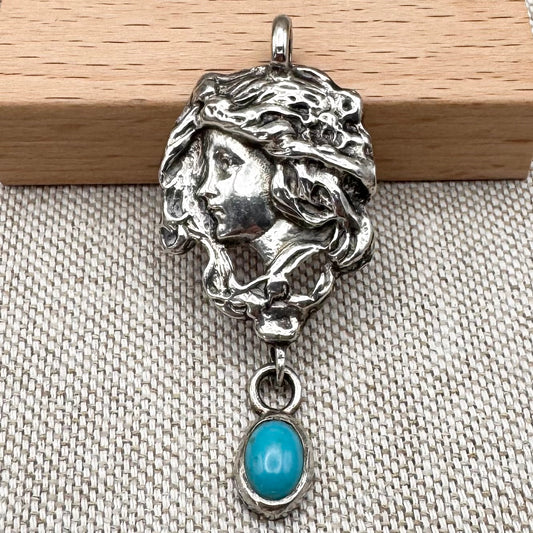Art Nouveau style silver lady pendant with turquoise drop, hallmarked London 1973