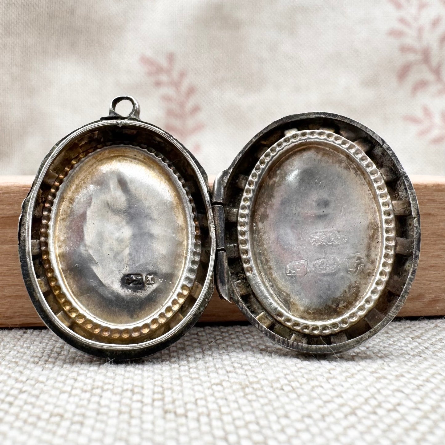 Victorian silver locket with engraved fern design, hallmarked Birmingham 1885