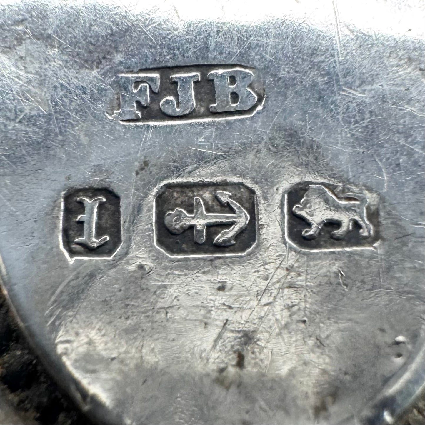 Victorian silver locket with engraved fern design, hallmarked Birmingham 1885