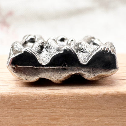 Vintage 'Three Wise Monkeys' silver pendant