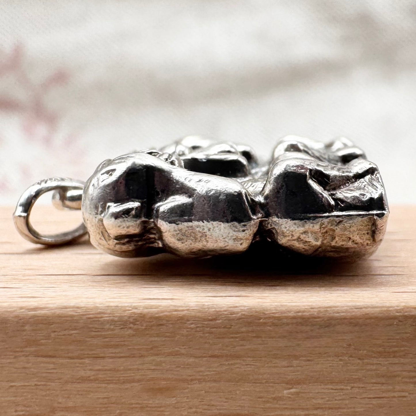 Vintage 'Three Wise Monkeys' silver pendant