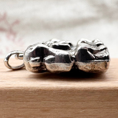 Vintage 'Three Wise Monkeys' silver pendant