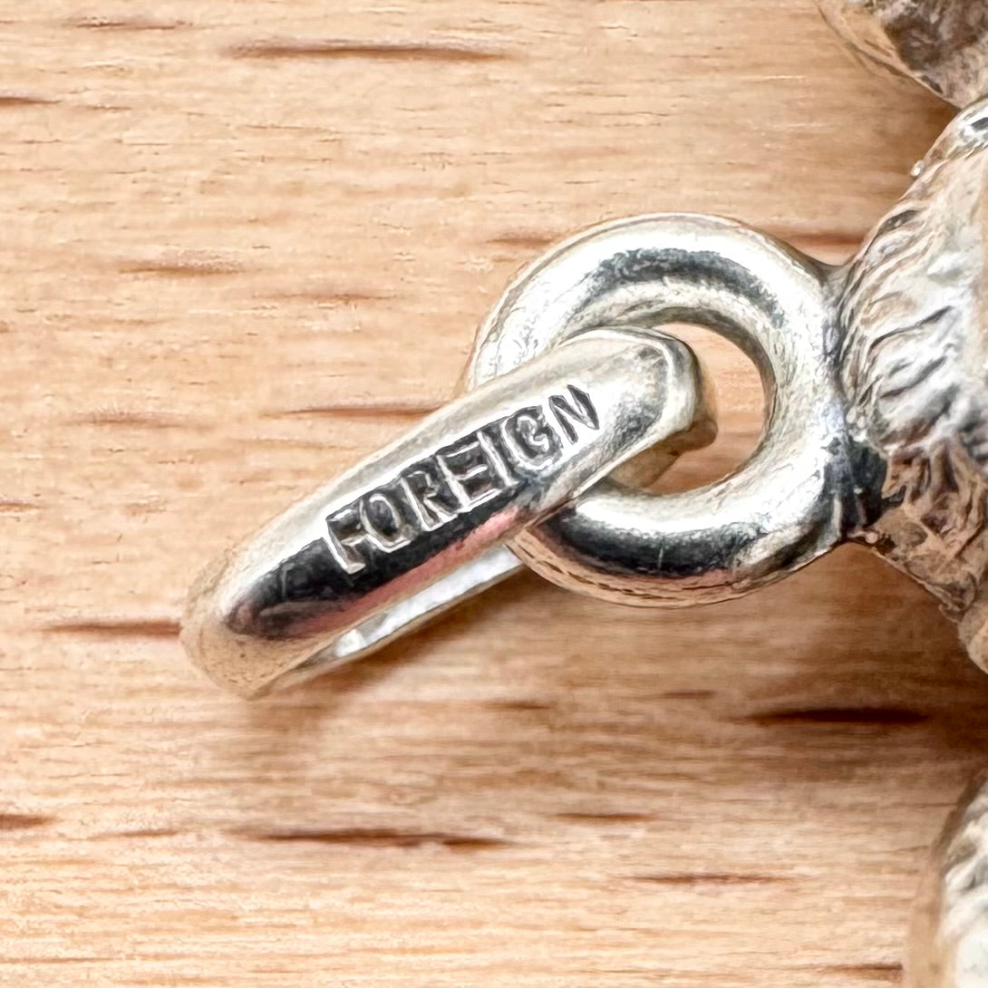 Vintage 'Three Wise Monkeys' silver pendant