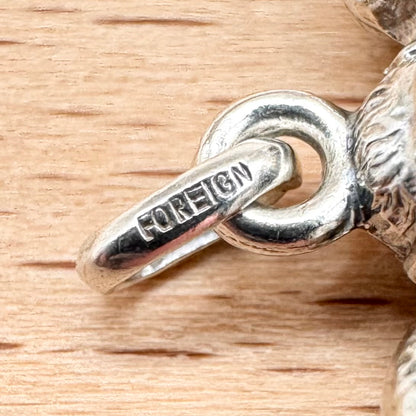 Vintage 'Three Wise Monkeys' silver pendant