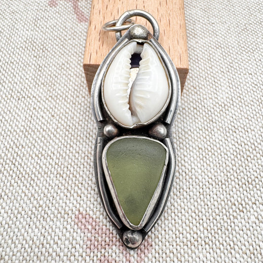 Sea glass & cowrie shell pendant by Smugglers Treasures, hallmarked Sheffield