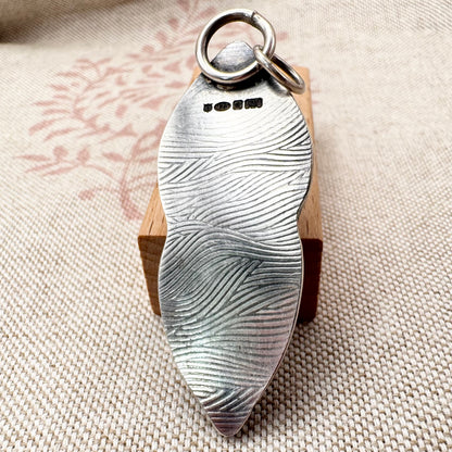 Sea glass & cowrie shell pendant by Smugglers Treasures, hallmarked Sheffield