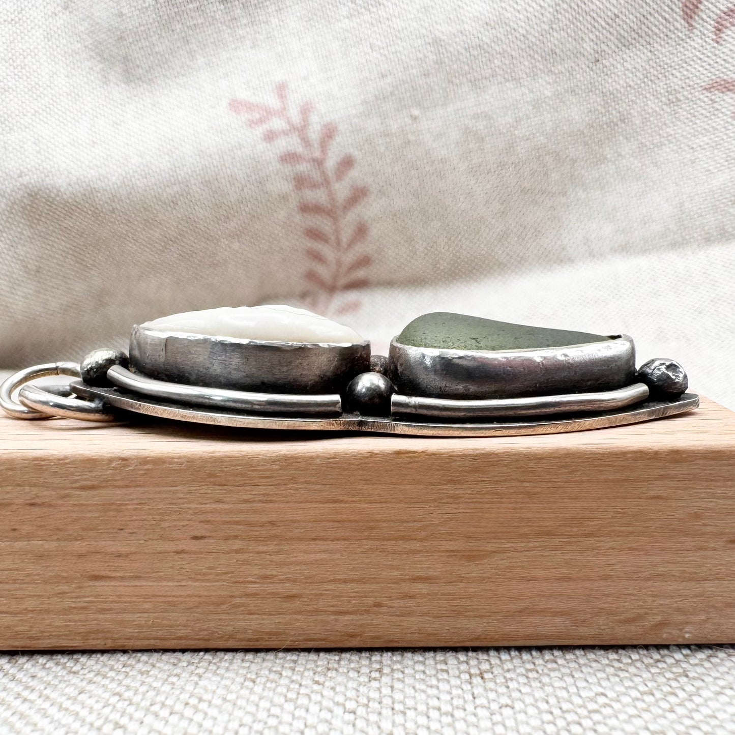 Sea glass & cowrie shell pendant by Smugglers Treasures, hallmarked Sheffield
