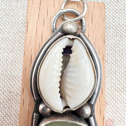 Sea glass & cowrie shell pendant by Smugglers Treasures, hallmarked Sheffield