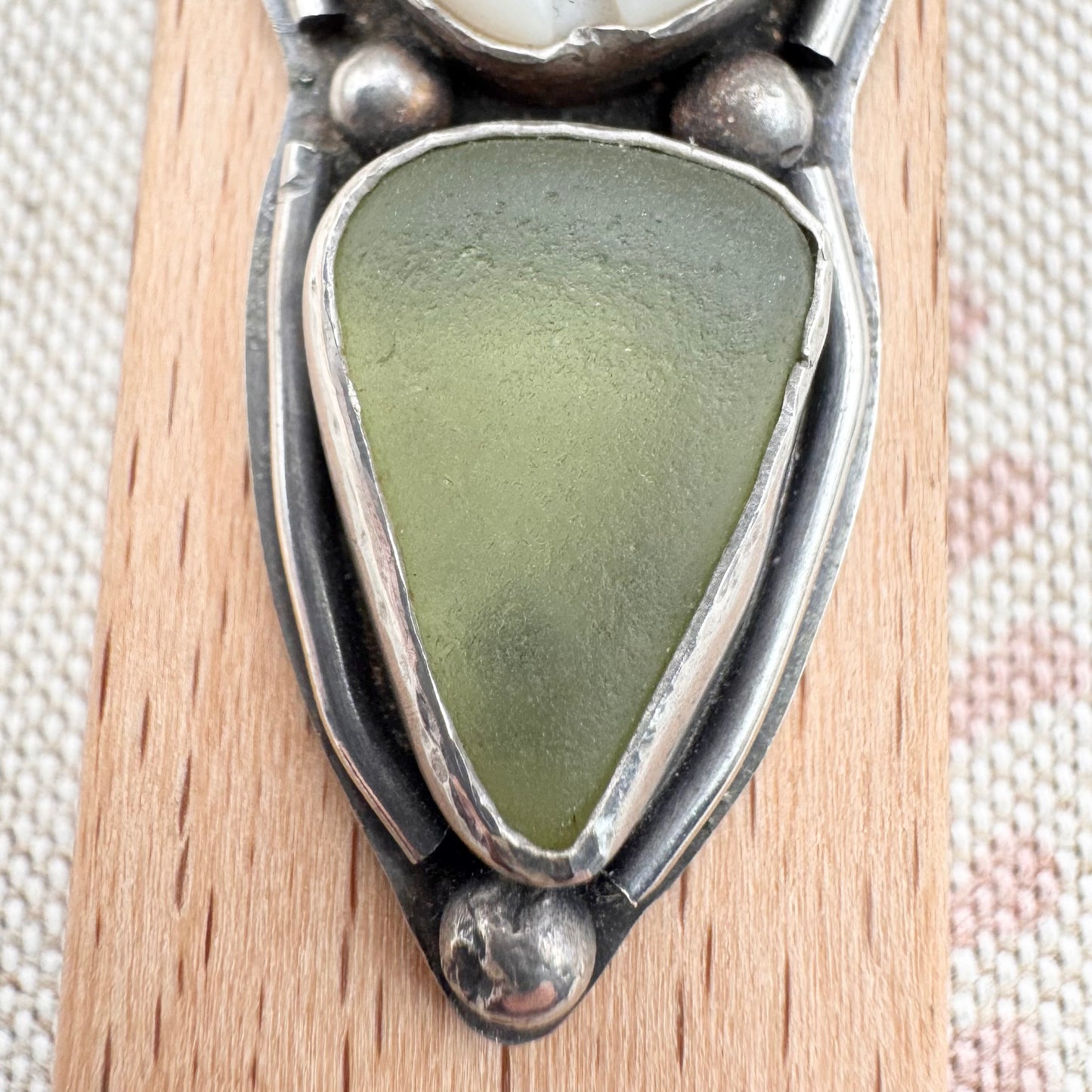 Sea glass & cowrie shell pendant by Smugglers Treasures, hallmarked Sheffield