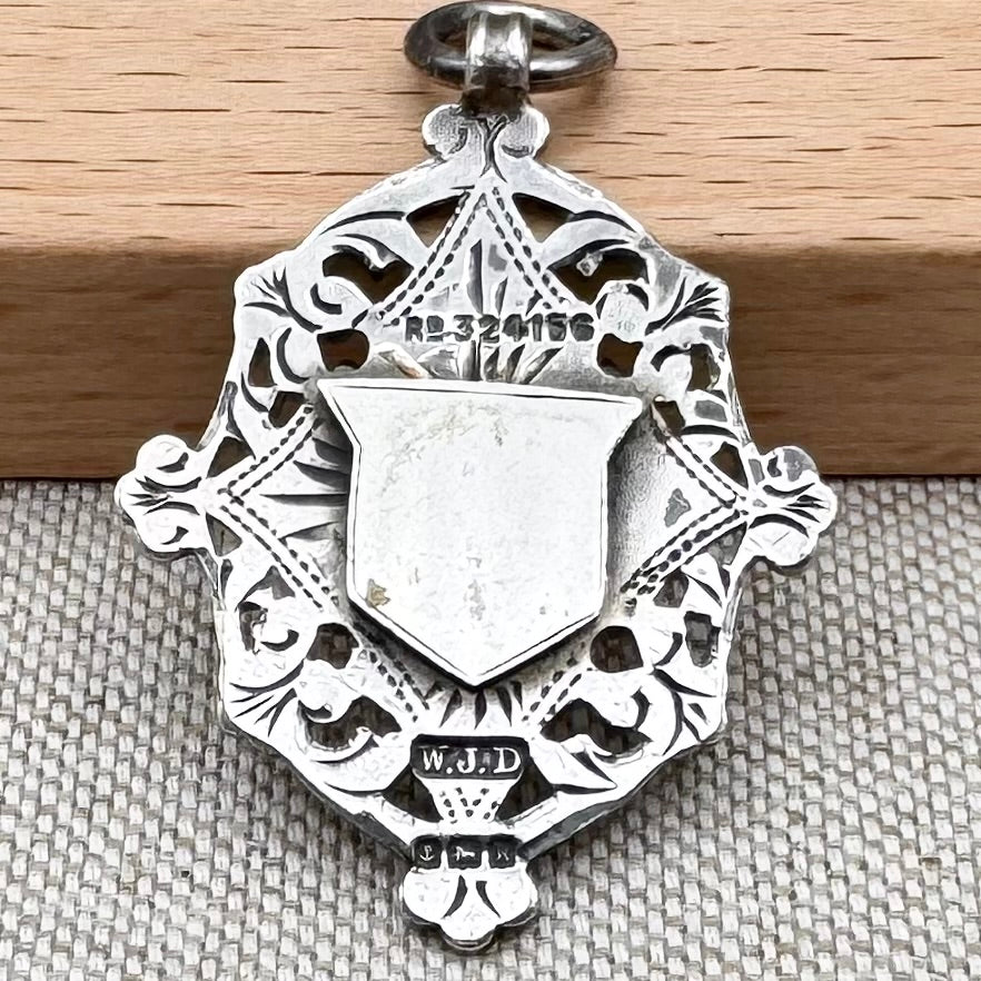 Antique Edwardian sterling silver and gilt medal fob pendant, hallmarked Birmingham 1909