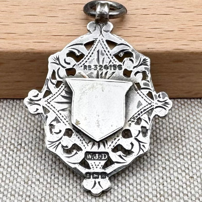 Antique Edwardian sterling silver and gilt medal fob pendant, hallmarked Birmingham 1909