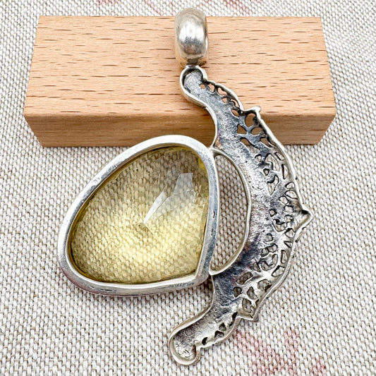 Citrine statement pendant with ornate openwork design