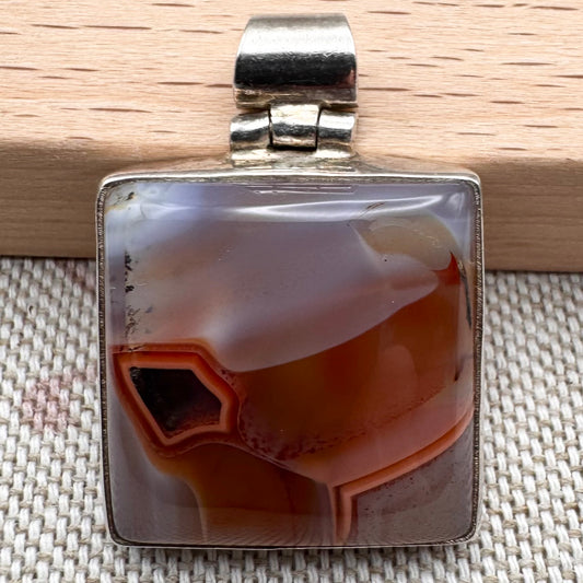 Silver banded agate pendant