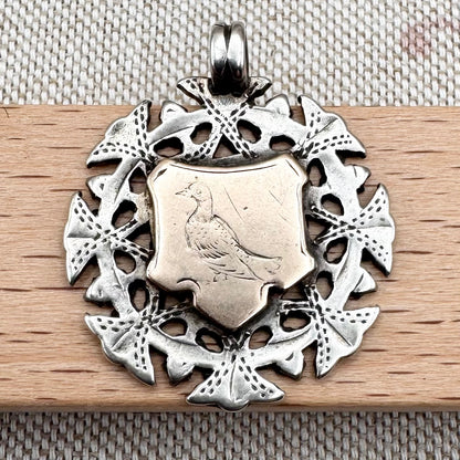 Antique silver & gilded pigeon fob medal, hallmarked for Birmingham, c.1894