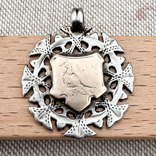 Antique silver & gilded pigeon fob medal, hallmarked for Birmingham, c.1894
