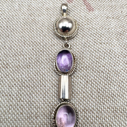 Silver and amethyst drop pendant