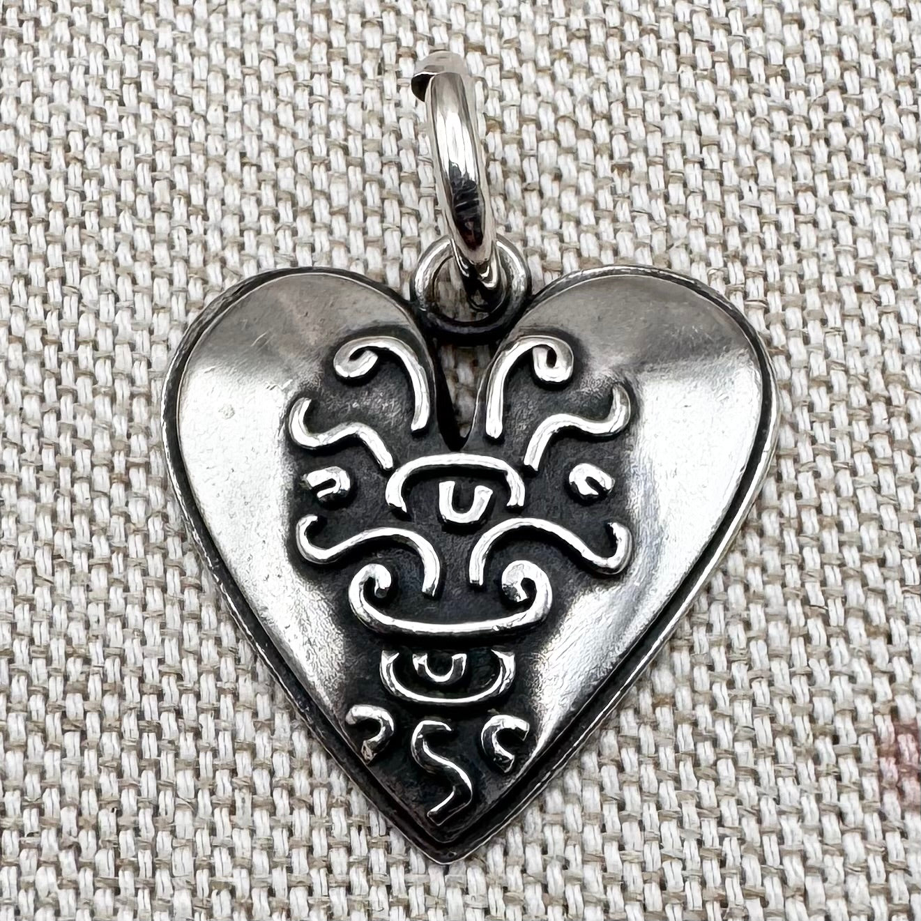 Silver 'Footprints' heart pendant