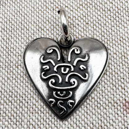 Silver 'Footprints' heart pendant