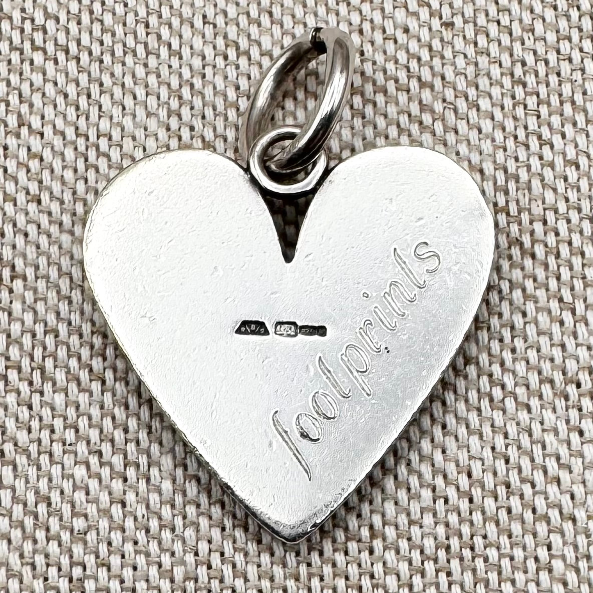 Silver 'Footprints' heart pendant