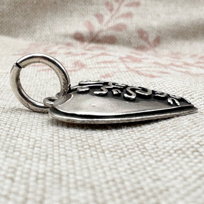 Silver 'Footprints' heart pendant