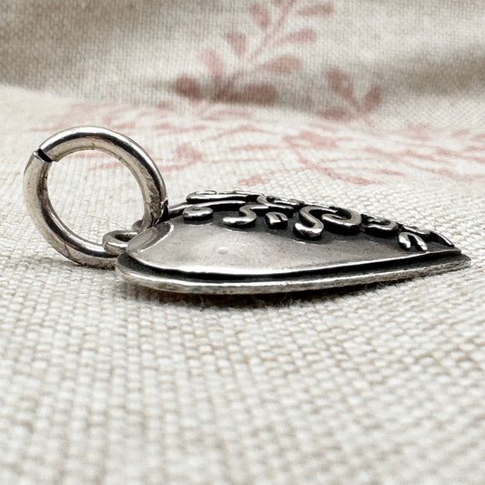 Silver 'Footprints' heart pendant