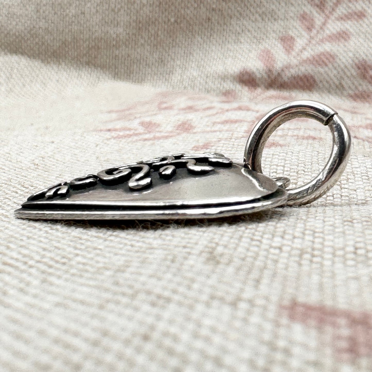 Silver 'Footprints' heart pendant