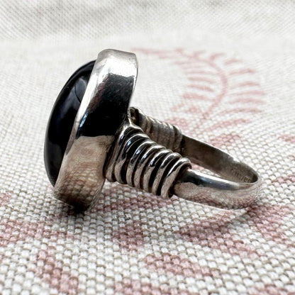 Black Botswana agate silver ring with coiled shoulders, size G.5 (US 3.5)