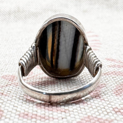Black Botswana agate silver ring with coiled shoulders, size G.5 (US 3.5)