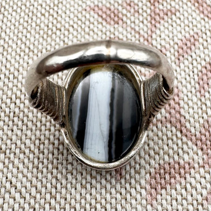 Black Botswana agate silver ring with coiled shoulders, size G.5 (US 3.5)
