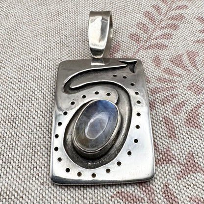 Large silver moonstone pendant with abstract arrow motif