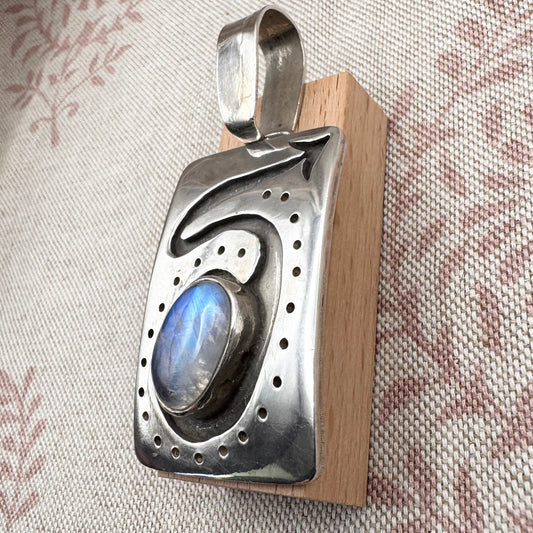 Large silver moonstone pendant with abstract arrow motif
