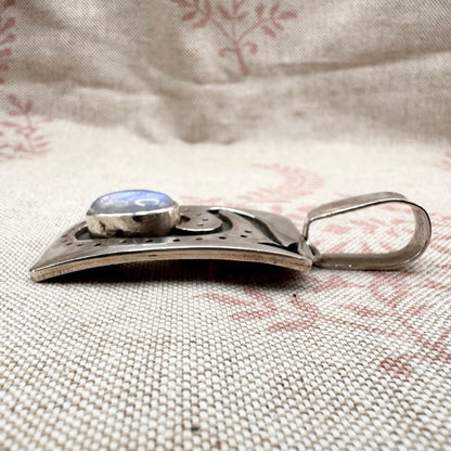 Large silver moonstone pendant with abstract arrow motif