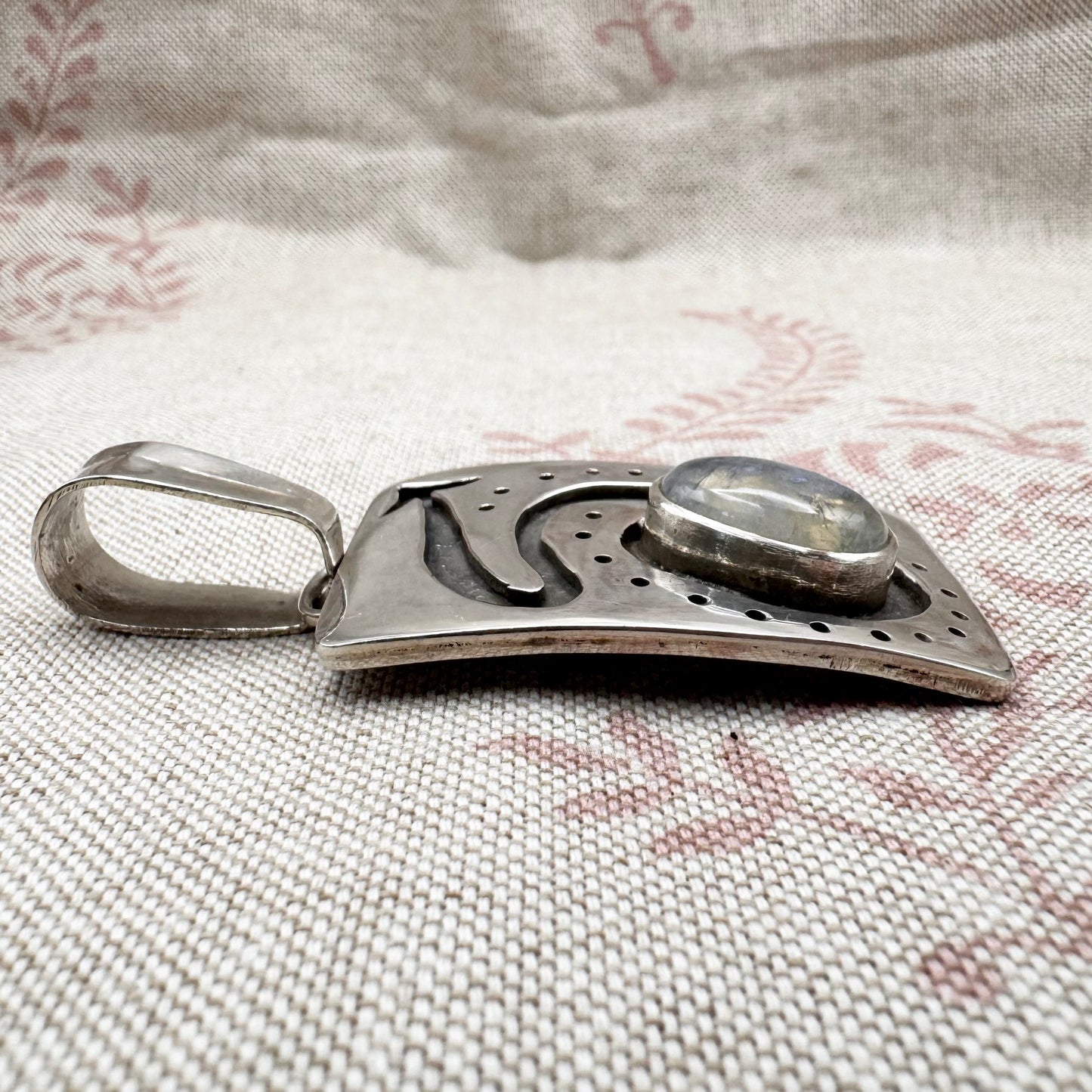 Large silver moonstone pendant with abstract arrow motif