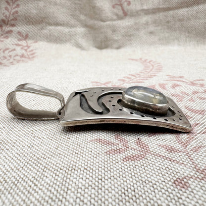 Large silver moonstone pendant with abstract arrow motif