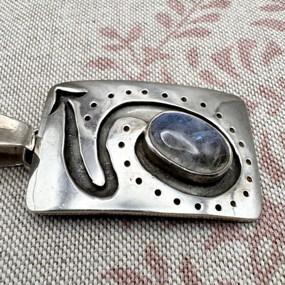 Large silver moonstone pendant with abstract arrow motif
